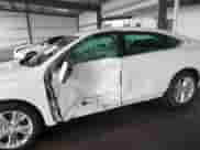 2015 Chevrolet Impala LT z VIN 1G1125S35FU139604, wystawiony jako IAAI lot #42096518 z przebiegiem 104 405 mil mil oraz . Historia ofert i sprzedaży dostępna na DreamBid. Obrazek 6.