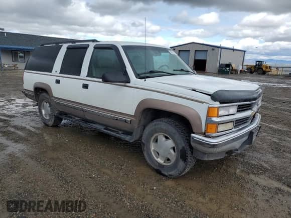 1996 Chevrolet Suburban с VIN 1GNFK16R5TJ316550, выставлен на аукционе Copart как лот 56913175 с пробегом 202 840 миль миль и Чистый • Clean title. История ставок и продаж доступна на DreamBid. Изображение 4.