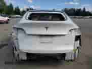2020 Tesla Model Y Long Range с VIN 5YJYGDEE6LF023427, выставлен на аукционе Copart как лот 81877945 с пробегом 52 307 миль миль и Списание • Salvage title. История ставок и продаж доступна на DreamBid. Изображение 6.