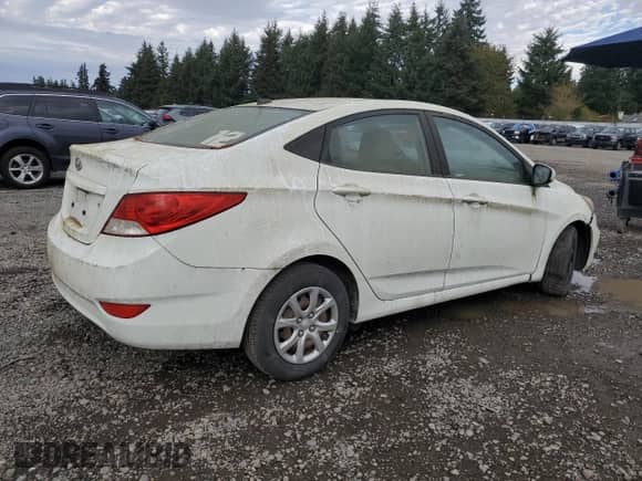 2014 Hyundai Accent GLS z VIN KMHCT4AE8EU656349, wystawiony jako Copart lot #89440825 z przebiegiem 150 288 mil mil oraz Czysty tytuł • Clean title. Historia ofert i sprzedaży dostępna na DreamBid. Obrazek 3.