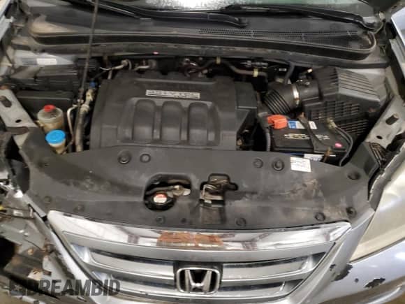 2007 Honda Odyssey EX-L z VIN 5FNRL38627B007553, wystawiony jako Copart lot #72029415 z przebiegiem 229 468 mil mil oraz Szkoda całkowita • Salvage title. Historia ofert i sprzedaży dostępna na DreamBid. Obrazek 12.