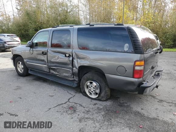 2002 Chevrolet Suburban LS z VIN 1GNFK16Z02J309178, wystawiony jako Copart lot #75254804 z przebiegiem 336 474 mil mil oraz Szkoda całkowita • Salvage title. Historia ofert i sprzedaży dostępna na DreamBid. Obrazek 2.
