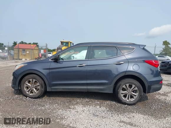 2014 Hyundai Santa Fe with VIN 5XYZUDLB5EG153555, listed as a IAAI auction lot 43145430 with 140,750 mi miles and . Bid and sale history available at DreamBid. Image 14.