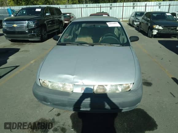 1999 Saturn SL with VIN 1G8ZF528XXZ348135, listed as a IAAI auction lot 34978282 with 280,721 mi miles and . Bid and sale history available at DreamBid. Image 6.