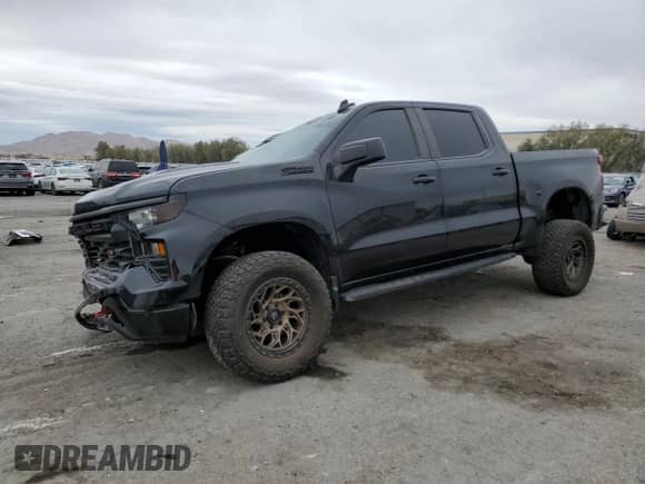 2023 Chevrolet Silverado 1500 Custom Trail Boss with VIN 3GCUDCEDXPG172089, listed as a Copart auction lot 48074715 with 32,880 mi miles and Salvage title. Bid and sale history available at DreamBid. Image 1.