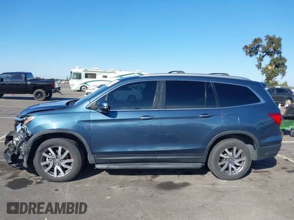 2019 Honda Pilot EX-L z VIN 5FNYF6H56KB044125, wystawiony jako IAAI lot #43115309 z przebiegiem 64 721 mil mil oraz . Historia ofert i sprzedaży dostępna na DreamBid. Obrazek 14.