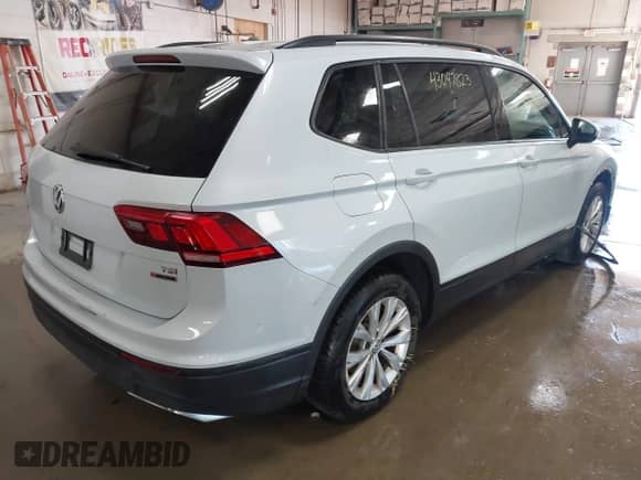 2018 Volkswagen Tiguan S с VIN 3VV0B7AX5JM108371, выставлен на аукционе IAAI как лот 43047823 с пробегом 80 531 миль миль и . История ставок и продаж доступна на DreamBid. Изображение 4.