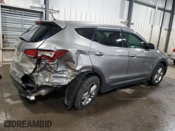 2018 Hyundai Santa Fe 2.4L с VIN 5NMZTDLB4JH105077, выставлен на аукционе Copart как лот 47288975 с пробегом 241 404 миль миль и Списание • Salvage title. История ставок и продаж доступна на DreamBid. Изображение 3.