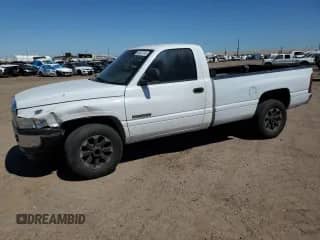 2001 Dodge RAM with VIN 3B6KC26ZX1M269062, listed as a Copart auction lot 56879715 with 172,568 mi miles and Salvage title. Bid and sale history available at DreamBid. Image 1.