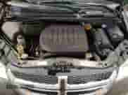 2018 Dodge Grand Caravan SE z VIN 2C4RDGBG5JR312871, wystawiony jako Copart lot #69593385 z przebiegiem 159 455 mil mil oraz Czysty tytuł • Clean title. Historia ofert i sprzedaży dostępna na DreamBid. Obrazek 12.