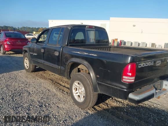 2001 Dodge Dakota Sport with VIN 1B7HG2ANX1S299183, listed as a IAAI auction lot 43302069 with 197,647 mi miles and . Bid and sale history available at DreamBid. Image 3.