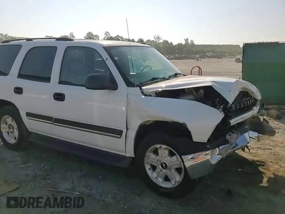 2005 Chevrolet Tahoe LS с VIN 1GNEC13V65R149100, выставлен на аукционе Copart как лот 61179975 с пробегом 283 123 миль миль и Списание • Salvage title. История ставок и продаж доступна на DreamBid. Изображение 14.