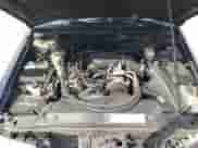 1999 Chevrolet Blazer LS z VIN 1GNCS13W3X2174681, wystawiony jako Copart lot #51832365 z przebiegiem 209 536 mil mil oraz Szkoda całkowita • Salvage title. Historia ofert i sprzedaży dostępna na DreamBid. Obrazek 12.