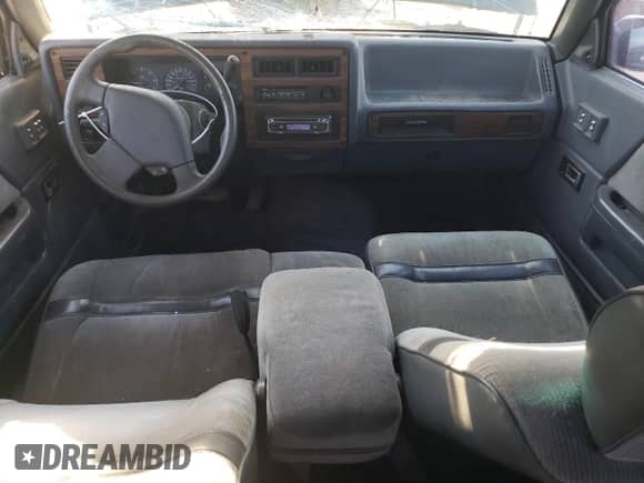 1993 Dodge Dakota z VIN 1B7GL23Y8PS163318, wystawiony jako Copart lot #78370024 z przebiegiem 182 015 mil mil oraz Nie do naprawy • Non repairable. Historia ofert i sprzedaży dostępna na DreamBid. Obrazek 8.