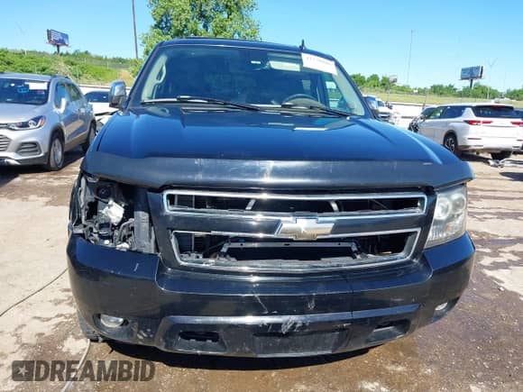2007 Chevrolet Suburban LTZ with VIN 3GNFK16337G275144, listed as a IAAI auction lot 42276018 with 240,031 mi miles and . Bid and sale history available at DreamBid. Image 12.