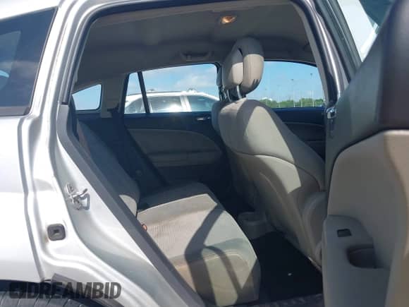 2010 Dodge Caliber SXT with VIN 1B3CB4HA7AD660883, listed as a IAAI auction lot 42270568 with 146,723 mi miles and . Bid and sale history available at DreamBid. Image 8.