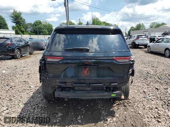 2023 Jeep Grand Cherokee Limited with VIN 1C4RJHBG6PC500802, listed as a Copart auction lot 61418395 with 22,703 mi miles and Salvage title. Bid and sale history available at DreamBid. Image 6.