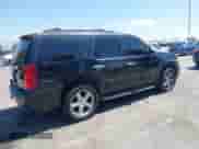 2009 Chevrolet Tahoe 2LT with VIN 1GNFC23059R295332, listed as a IAAI auction lot 42679966 with 223,678 mi miles and . Bid and sale history available at DreamBid. Image 4.