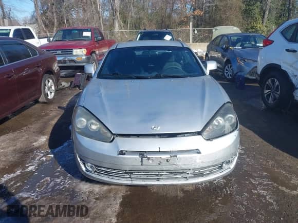 2008 Hyundai Tiburon GS z VIN KMHHM66D58U275433, wystawiony jako IAAI lot #41325486 z przebiegiem 266 121 mil mil oraz . Historia ofert i sprzedaży dostępna na DreamBid. Obrazek 12.