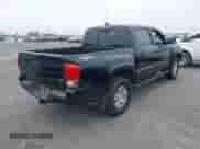 2017 Toyota Tacoma SR5 with VIN 3TMAZ5CN4HM047698, listed as a IAAI auction lot 42465382 with 132,297 mi miles and . Bid and sale history available at DreamBid. Image 4.