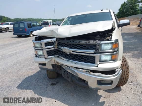 2014 Chevrolet Silverado 1500 LT z VIN 3GCUKREC3EG137228, wystawiony jako IAAI lot #42484505 z przebiegiem 153 954 mil mil oraz . Historia ofert i sprzedaży dostępna na DreamBid. Obrazek 13.