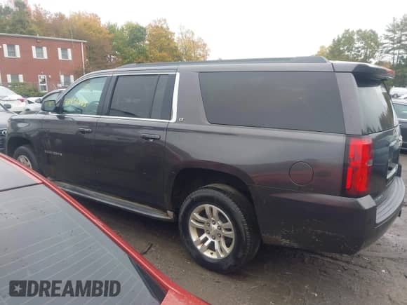 2015 Chevrolet Suburban LT z VIN 1GNSKJKCXFR182558, wystawiony jako IAAI lot #43456883 z przebiegiem 227 433 mil mil oraz . Historia ofert i sprzedaży dostępna na DreamBid. Obrazek 14.