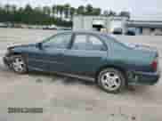 1997 Honda Accord LX with VIN 1HGCD5638VA053287, listed as a Copart auction lot 71704015 with 332,299 mi miles and Clean title. Bid and sale history available at DreamBid. Image 2.