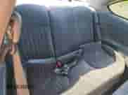 1999 Pontiac Grand Am GT z VIN 1G2NW12EXXM869943, wystawiony jako Copart lot #65240175 z przebiegiem 148 984 mil mil oraz Nie do naprawy • Non repairable. Historia ofert i sprzedaży dostępna na DreamBid. Obrazek 10.