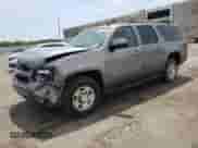2012 Chevrolet Suburban z VIN 1GNWKMEG3CR211461, wystawiony jako Copart lot #51816794 z przebiegiem 187 088 mil mil oraz Szkoda całkowita • Salvage title. Historia ofert i sprzedaży dostępna na DreamBid. Obrazek 1.