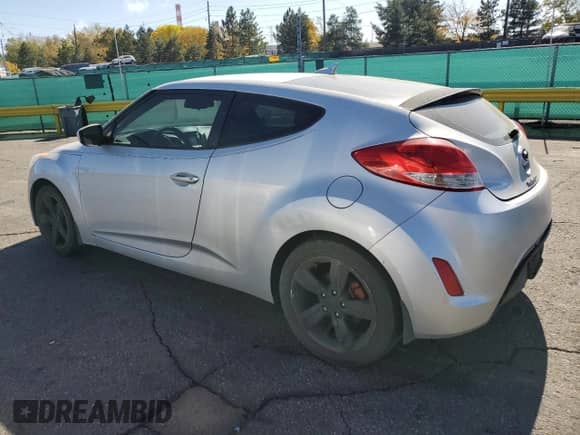 2013 Hyundai Veloster w/Black Int z VIN KMHTC6AD4DU110472, wystawiony jako Copart lot #87228405 z przebiegiem 117 326 mil mil oraz Nie do naprawy • Non repairable. Historia ofert i sprzedaży dostępna na DreamBid. Obrazek 2.