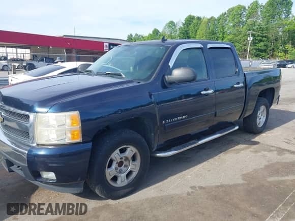 2007 Chevrolet Silverado 1500 1LT with VIN 2GCEC130771595295, listed as a IAAI auction lot 42298256 with 238,987 mi miles and . Bid and sale history available at DreamBid. Image 2.