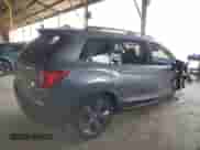2020 Honda Passport Touring with VIN 5FNYF7H90LB003869, listed as a Copart auction lot 63877165 with 57,387 mi miles and Salvage title. Bid and sale history available at DreamBid. Image 3.