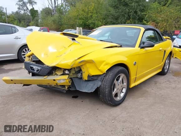 2004 Ford Mustang Deluxe с VIN 1FAFP44604F139064, выставлен на аукционе IAAI как лот 43342376 с пробегом 71 707 миль миль и . История ставок и продаж доступна на DreamBid. Изображение 2.