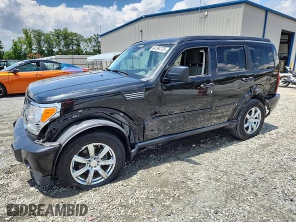 2009 Dodge Nitro SLT with VIN 1D8GU58K49W544504, listed as a Copart auction lot 64194735 with 98,886 mi miles and Salvage title. Bid and sale history available at DreamBid. Image 1.