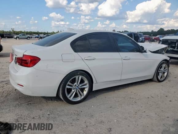 2018 BMW 3 Series 320i with VIN WBA8E1G58JNU89244, listed as a Copart auction lot 81389415 with 61,309 mi miles and Salvage title. Bid and sale history available at DreamBid. Image 3.
