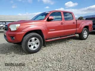2013 Toyota Tacoma PreRunner with VIN 3TMKU4HN2DM036179, listed as a Copart auction lot 80193705 with 136,566 mi miles and Salvage title. Bid and sale history available at DreamBid. Image 1.