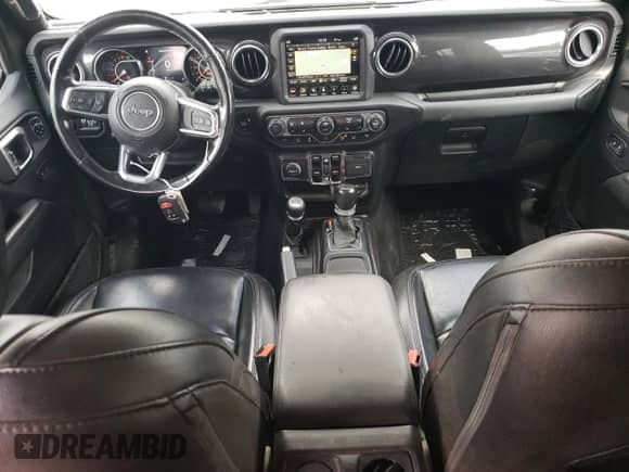 2021 Jeep Wrangler Unlimited Sahara Altitude with VIN 1C4HJXEG2MW605137, listed as a Copart auction lot 67749615 with 66,869 mi miles and Salvage title. Bid and sale history available at DreamBid. Image 8.