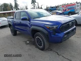 2024 Toyota Tacoma SR5 with VIN 3TMLB5JN5RM004554, listed as a IAAI auction lot 43313502 with 23,923 mi miles and . Bid and sale history available at DreamBid. Image 1.