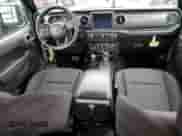 2023 Jeep Wrangler Willys with VIN 1C4HJXDGXPW545601, listed as a Copart auction lot 50020905 with 19,115 mi miles and Salvage title. Bid and sale history available at DreamBid. Image 8.