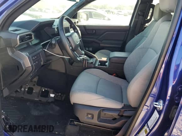 2024 Toyota Tacoma TRD Off Road with VIN 3TMLB5JN0RM031080, listed as a Copart auction lot 70222045 with 3,177 mi miles and Salvage title. Bid and sale history available at DreamBid. Image 7.