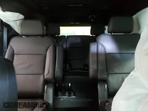 2023 Chevrolet Suburban Z71 с VIN 1GNSKDKD6PR325632, выставлен на аукционе Copart как лот 56216585 с пробегом 53 398 миль миль и Списание • Salvage title. История ставок и продаж доступна на DreamBid. Изображение 10.