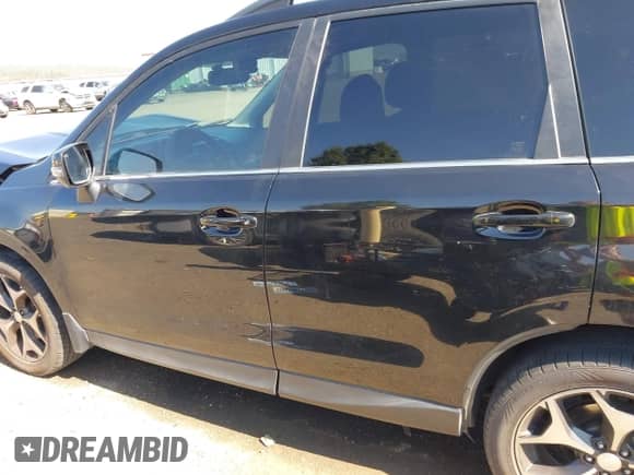 2014 Subaru Forester XT Touring z VIN JF2SJGMCXEH530537, wystawiony jako IAAI lot #43267826 z przebiegiem 102 917 mil mil oraz . Historia ofert i sprzedaży dostępna na DreamBid. Obrazek 14.