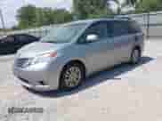 2011 Toyota Sienna XLE AAS with VIN 5TDYK3DC8BS146813, listed as a IAAI auction lot 42982003 with 441,565 mi miles and . Bid and sale history available at DreamBid. Image 2.