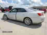 2016 Chevrolet Malibu LTZ with VIN 1G11E5SA0GF162770, listed as a Copart auction lot 62420635 with 197,908 mi miles and Salvage title. Bid and sale history available at DreamBid. Image 2.