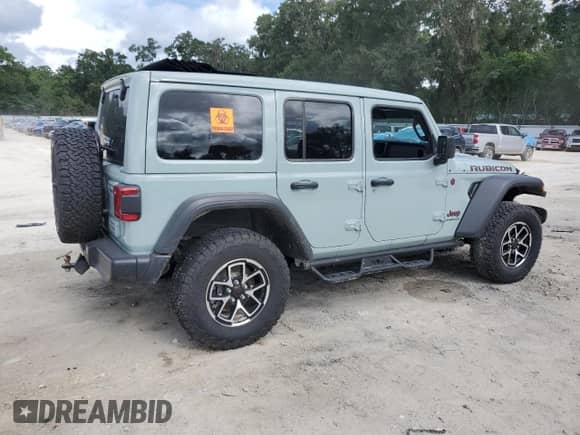 2024 Jeep Wrangler Rubicon with VIN 1C4PJXFG7RW257028, listed as a Copart auction lot 63153535 with Not provided miles and Salvage title. Bid and sale history available at DreamBid. Image 3.