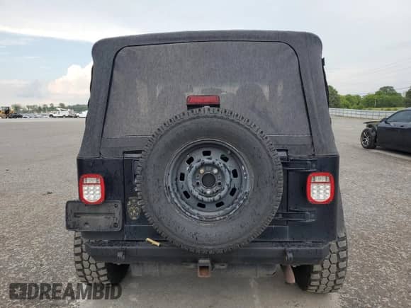 2001 Jeep Wrangler SE with VIN 1J4FA29P41P328835, listed as a Copart auction lot 68713745 with 274,578 mi miles and Clean title. Bid and sale history available at DreamBid. Image 6.