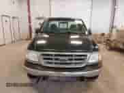 2002 Ford F-150 XL с VIN 2FTRF17W42CA68335, выставлен на аукционе IAAI как лот 42307601 с пробегом 184 138 миль миль и . История ставок и продаж доступна на DreamBid. Изображение 6.