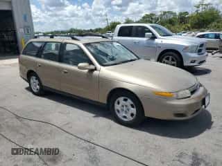 2000 Saturn LW with VIN 1G8JW82R7YY625810, listed as a Copart auction lot 68722285 with 125,702 mi miles and Salvage title. Bid and sale history available at DreamBid. Image 4.