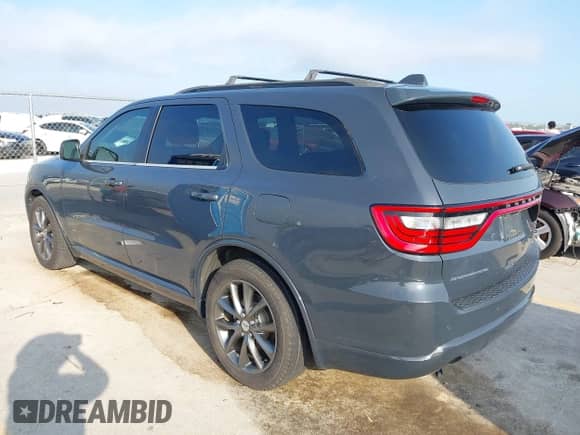 2018 Dodge Durango GT with VIN 1C4RDHDG2JC261602, listed as a IAAI auction lot 43082293 with 61,642 mi miles and . Bid and sale history available at DreamBid. Image 3.