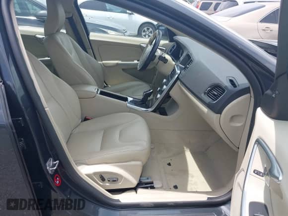 2015 Volvo S60 T5 Drive-E Premier with VIN YV140MFK4F2337702, listed as a IAAI auction lot 42771004 with 129,348 mi miles and . Bid and sale history available at DreamBid. Image 5.